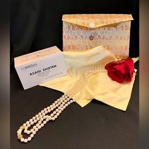 Asahi Pearls 50 inch Cultured Pearl Necklace with Gold Accents Silk Case Classic